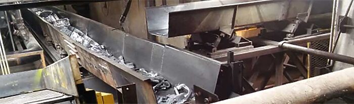 High-Volume Metal Scrap Handling | Steel Belt Conveyor | PRAB
