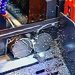Manufacturing cost reduction through material recycling systems